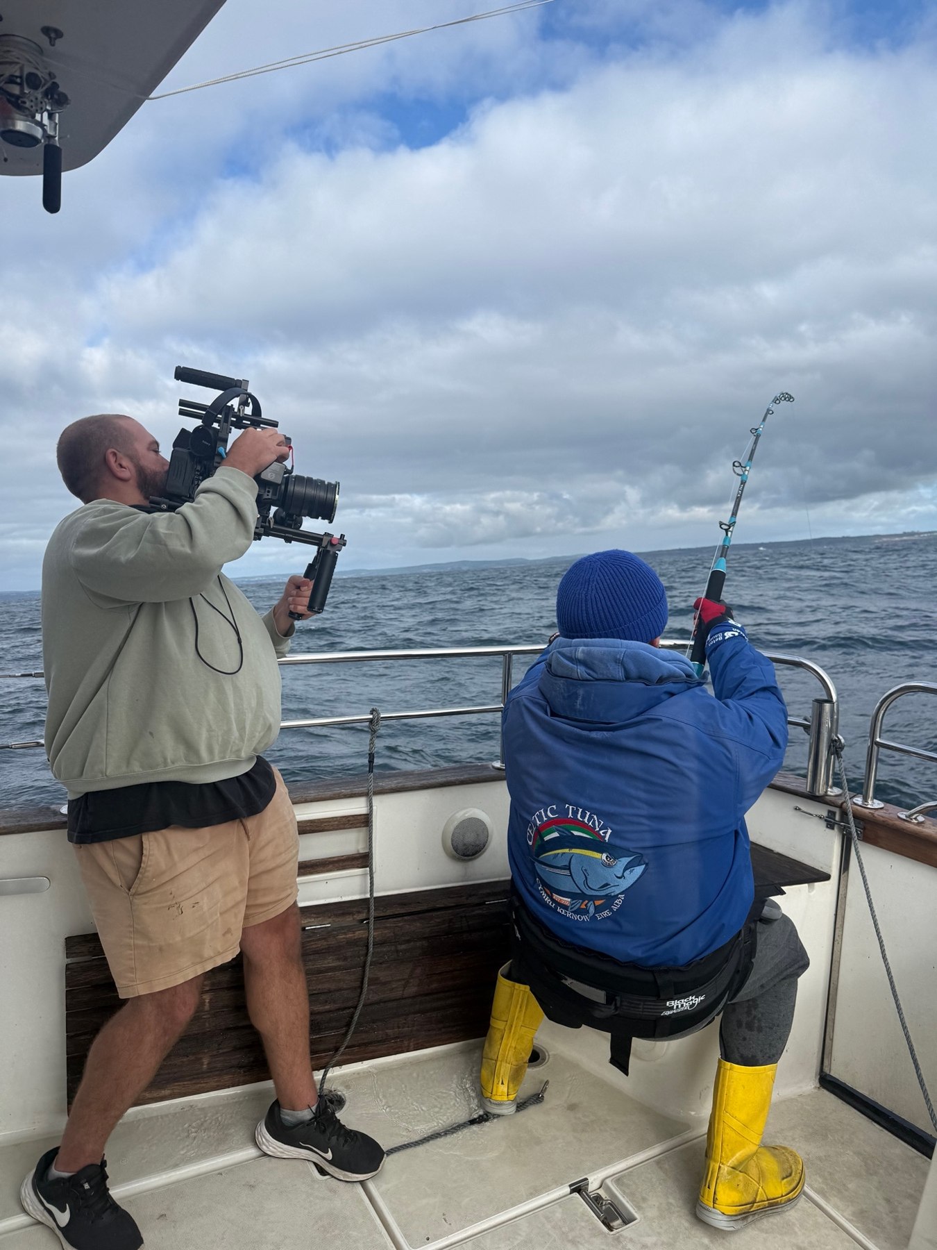 Crew and an angler on deck